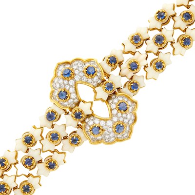Lot 2110 - Tiffany & Co. Gold, Platinum, Carved White Coral, Cabochon Sapphire and Diamond Link Bracelet