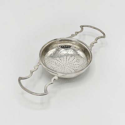 Lot 1219 - English Sterling Silver Lemon Strainer