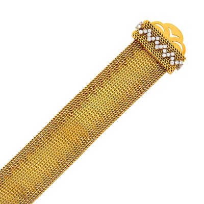 Lot 172 - Gubelin Wide Gold, Platinum and Diamond Mesh Slide Bracelet