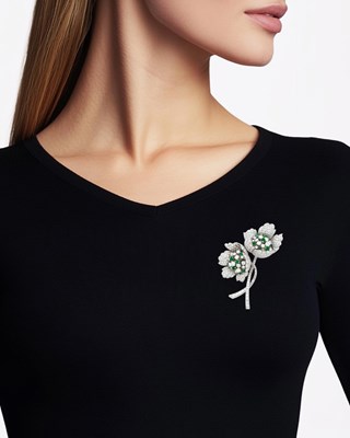 Lot 149 - Platinum, Diamond and Emerald Flower Clip-Brooch