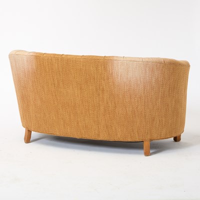 Lot 557 - Upholstered Blondewood Love Seat