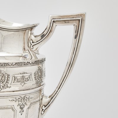 Lot 181 - Graff, Washbourne & Dunn for Brand-Chatillon Sterling Silver Water Pitcher and Similar Footed Stand