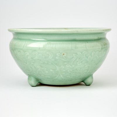 Lot 576 - A Chinese Celadon Glazed Porcelain Tripod Censer