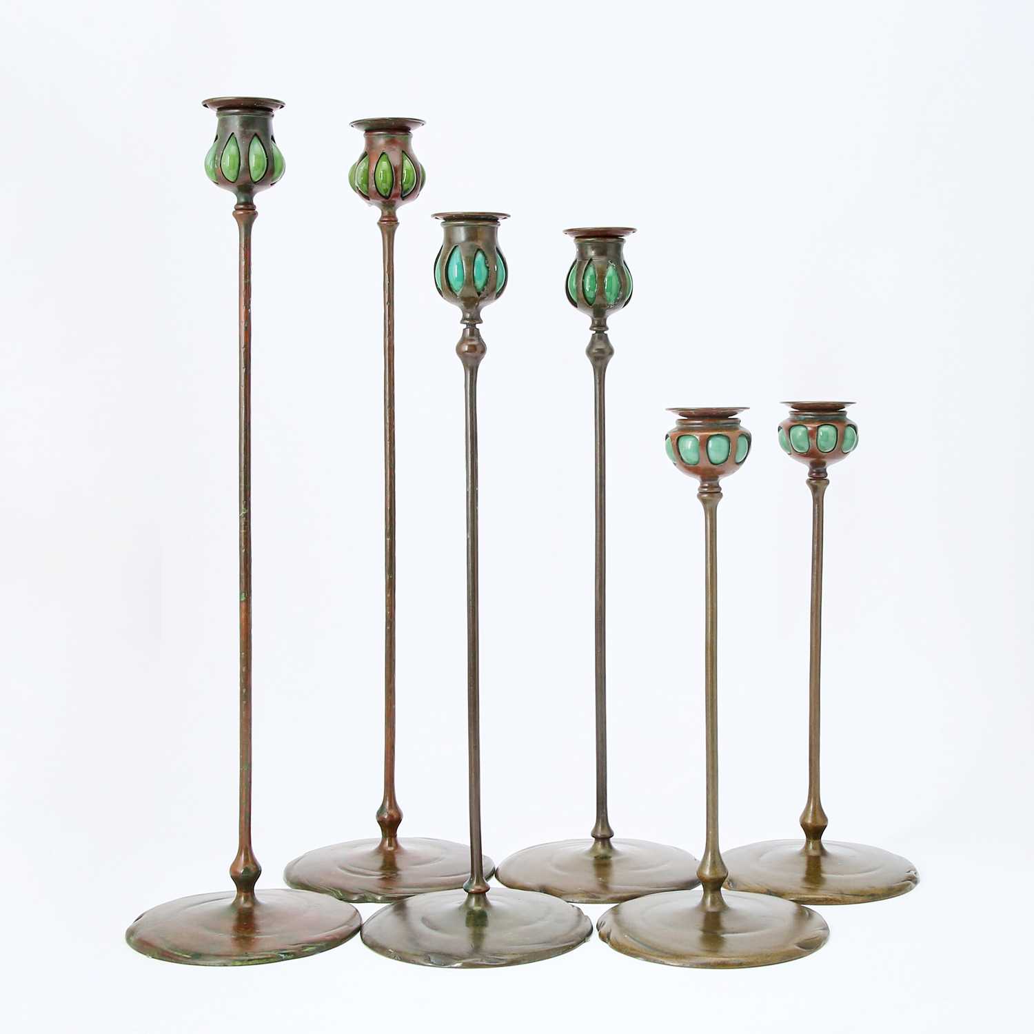 Lot 221 - Group of Six Tiffany Studios Patinated Bronze and Green Favrile Glass Blow-Out Candlesticks