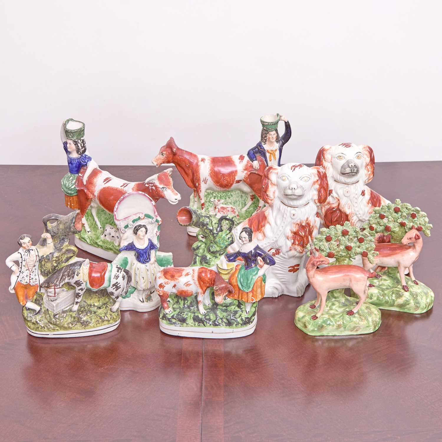 Lot 218 - Pair of English Staffordshire Pottery Figures with Cows