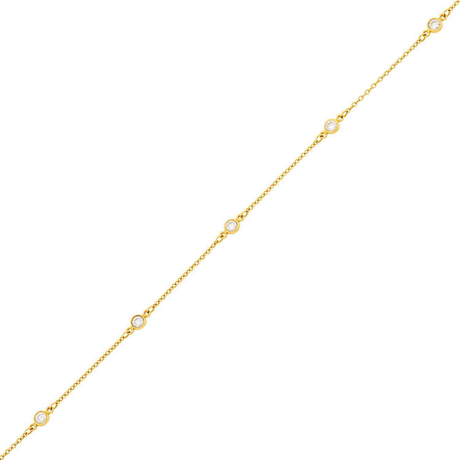 Lot 12 - Tiffany & Co., Elsa Peretti Gold and Diamond 'Diamonds by the Yard' Bracelet
