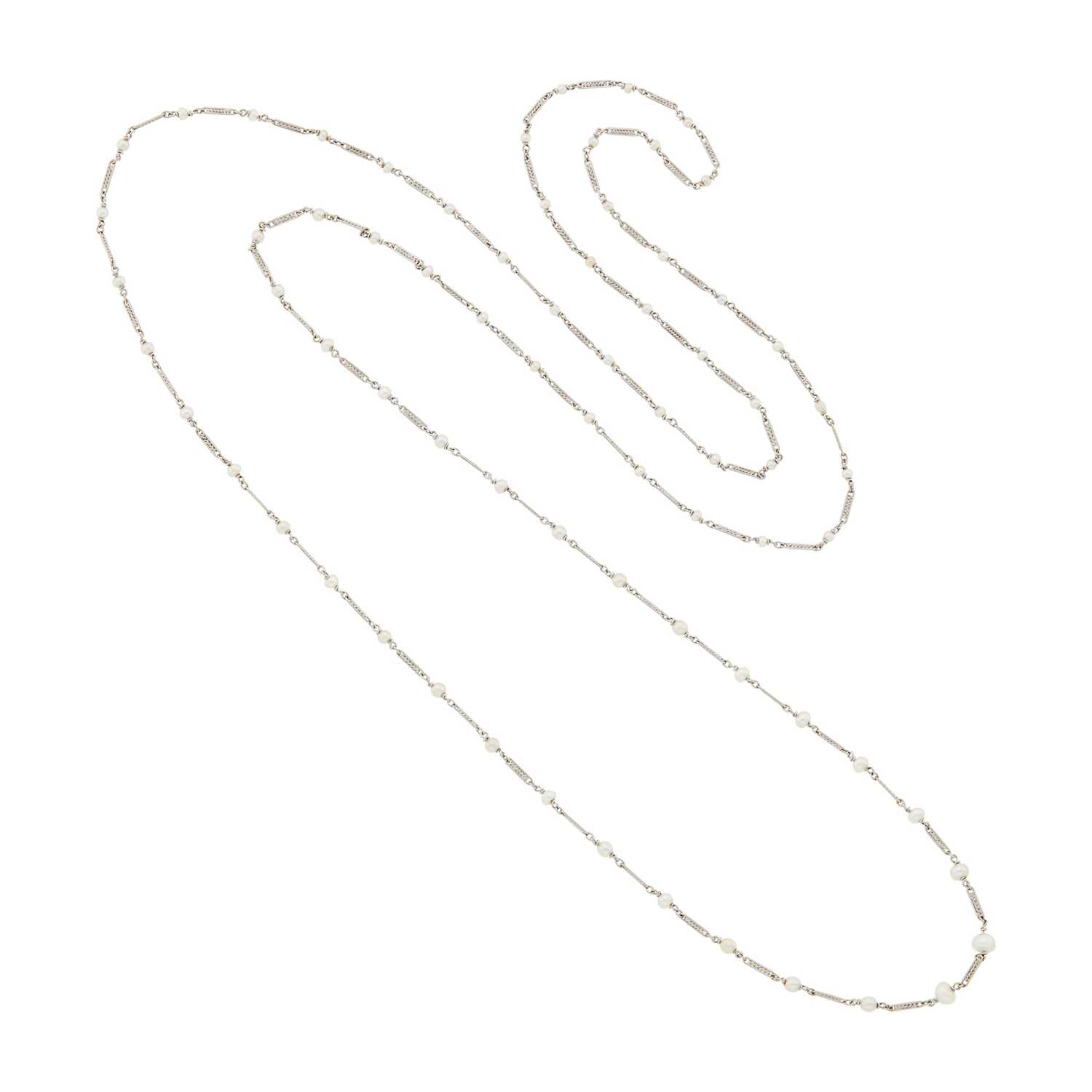 Lot 33 - Long White Gold and Seed Pearl Necklace