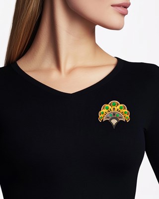 Lot 92 - Bulgari Gold, Cabochon Emerald, Diamond, Black Onyx and Chalcedony Clip-Brooch