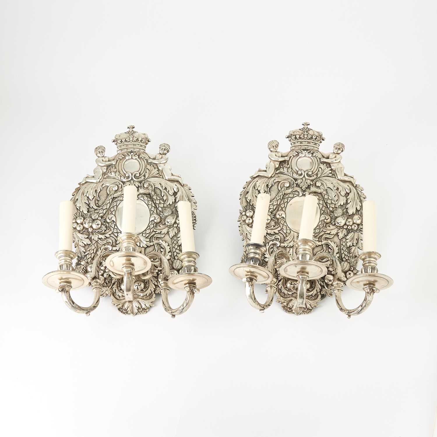 Lot 577 - Pair of Louis XIV Style Silver Plated Three-Light Wall Sconces