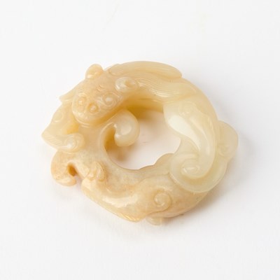 Lot 362 - A Chinese White and Russet Jade 'Dragon' Plaque