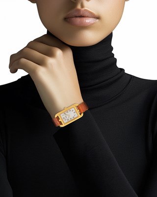Lot 1003 - Hermès Gold and Mother-of-Pearl 'Cape Cod' Wristwatch