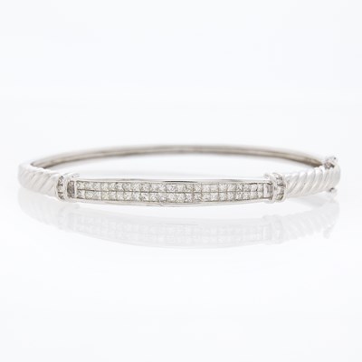 Lot 2099 - White Gold and Invisibly-Set Diamond Bangle Bracelet