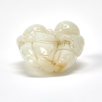 Lot 390 - A Chinese White Jade Carving of Hehe Erxian