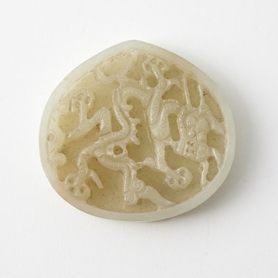 Lot 25 - A Chinese Carved White Jade Belt Plaque
