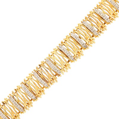 Lot 1301 - Two-Color Gold and Diamond Link Bracelet