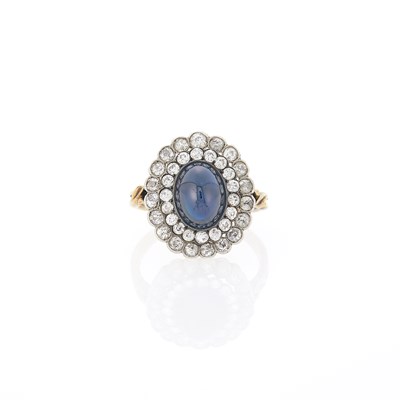 Lot 2140 - Gold, Platinum, Cabochon Sapphire and Diamond Ring