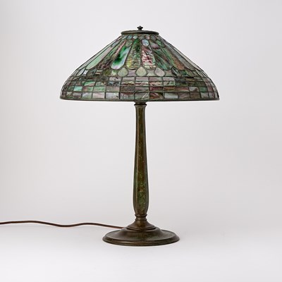 Lot 679 - Tiffany Studios Bronze and Leaded Glass 'Feather’ Table Lamp