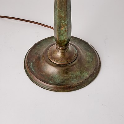 Lot 679 - Tiffany Studios Bronze and Leaded Glass 'Feather’ Table Lamp