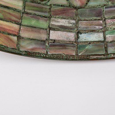 Lot 679 - Tiffany Studios Bronze and Leaded Glass 'Feather’ Table Lamp