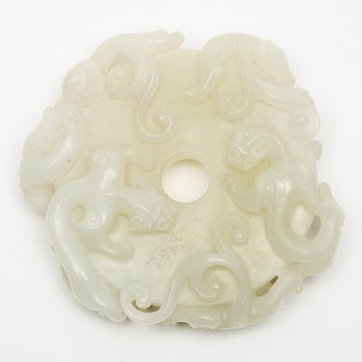 Lot 438 - A Chinese Archaistic White Jade Bi Disc