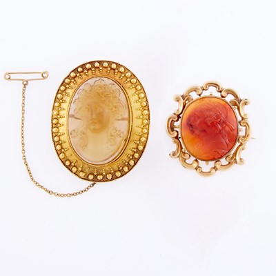 Lot 3174 - Two Gold, Carved Smoky Quartz and Carnelian Cameo Brooches
