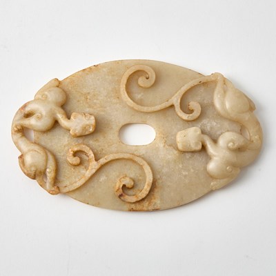 Lot 437 - A Chinese Archaistic Jade Disc