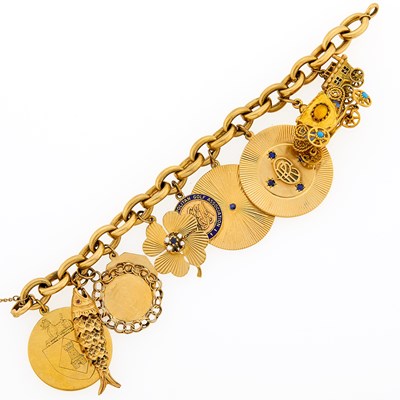 Lot 2075 - Gold, Low Karat Gold and Gem-Set Charm Bracelet