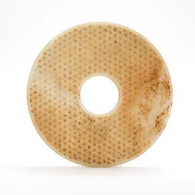 Lot 3 - A Chinese Archaistic Jade Bi Disc