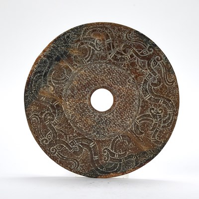 Lot 1 - A Chinese Archaistic Jade Bi Disc