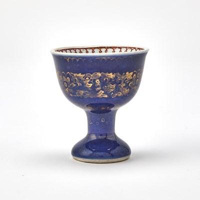 Lot 587 - A Chinese Gilt-Decorated Powder Blue Porcelain Stem Cup