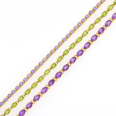 Lot 2235 - Three Gold, Low Karat Gold and Colored Stone Bracelets