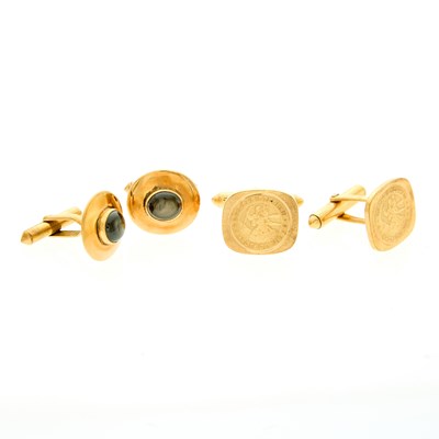 Lot 2210 - Two Pairs of Gold and Black Star Sapphire Cufflinks