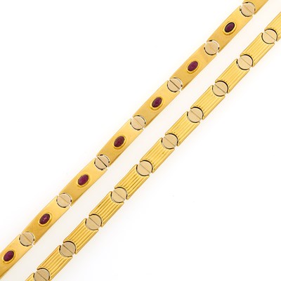 Lot 2052 - Two Two-Color Gold and Cabochon Ruby Bracelets