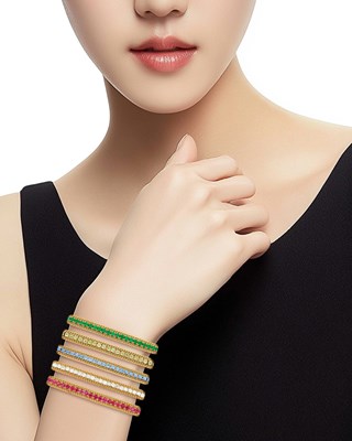 Lot 116 - Five Gold, Diamond and Gem-Set Bracelets