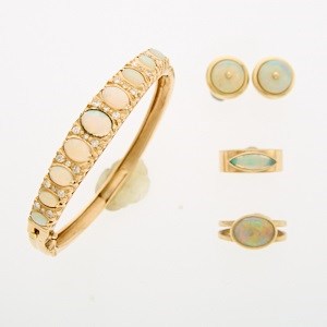 Lot 2218 - Gold, White Opal and Diamond Bangle Bracelet, Two Rings and Pair of Earrings
