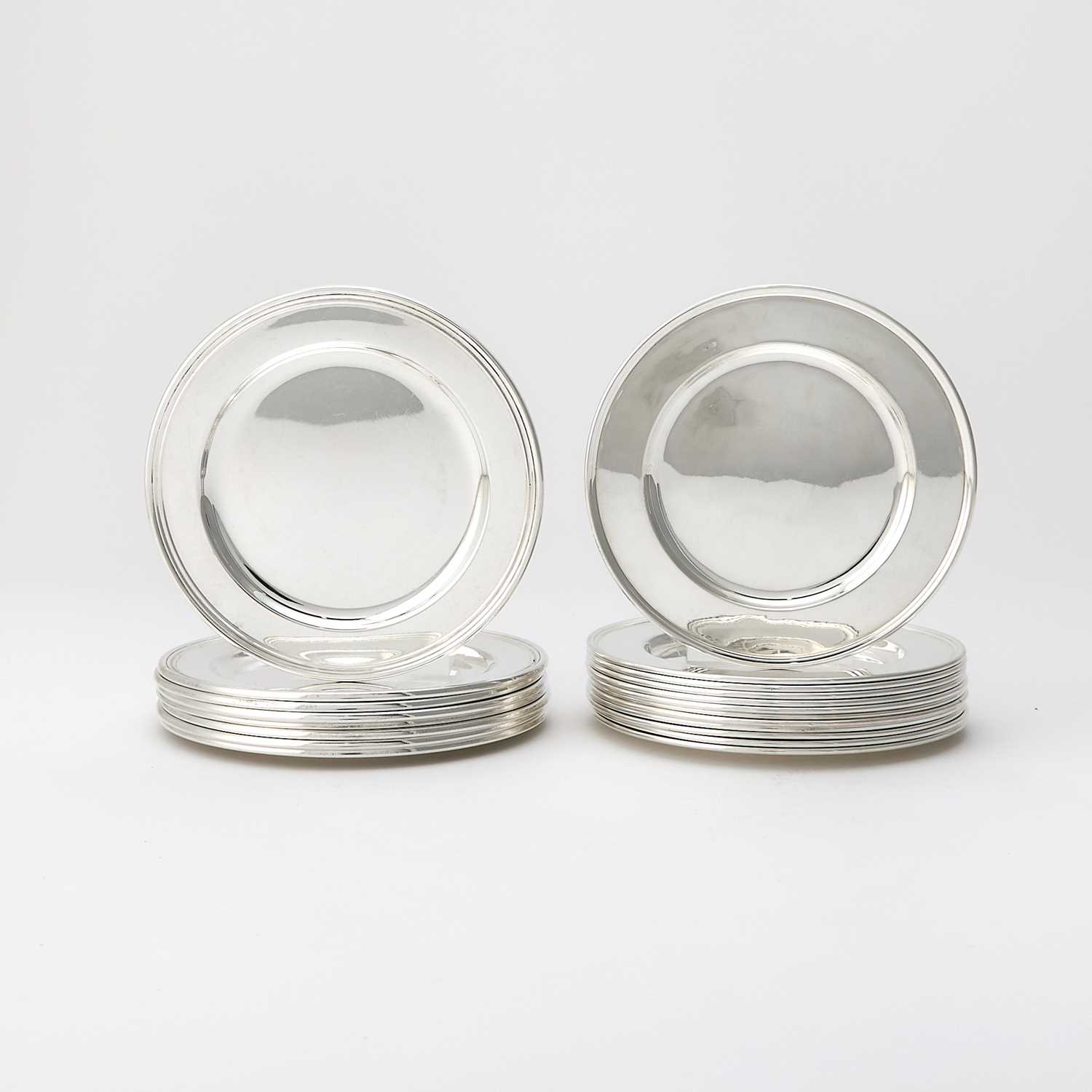 Lot 84 - Set of Twelve Tiffany & Co. and Set of Eight Cartier Sterling Silver Bread Plates