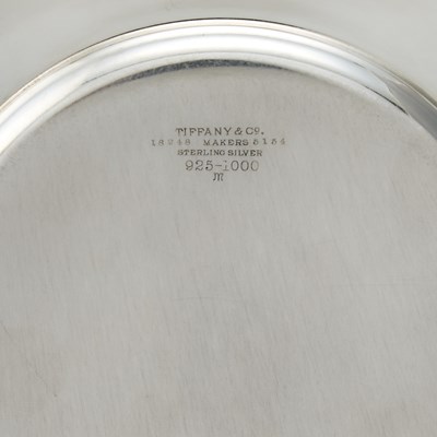 Lot 84 - Set of Twelve Tiffany & Co. and Set of Eight Cartier Sterling Silver Bread Plates