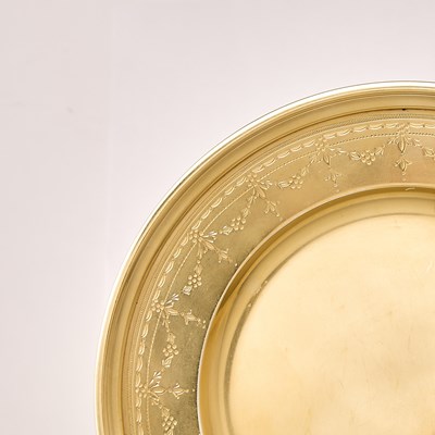 Lot 41 - Set of Twelve Tiffany & Co. Sterling Silver-Gilt Bread Plates