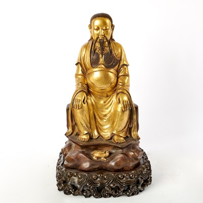 Lot 14 - A Large and Heavily-Cast Chinese Gilt Bronze Seated Daoist Figure