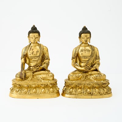 Lot 44 - Two Chinese Finely Gilded Cast Bronze Figures of Buddha