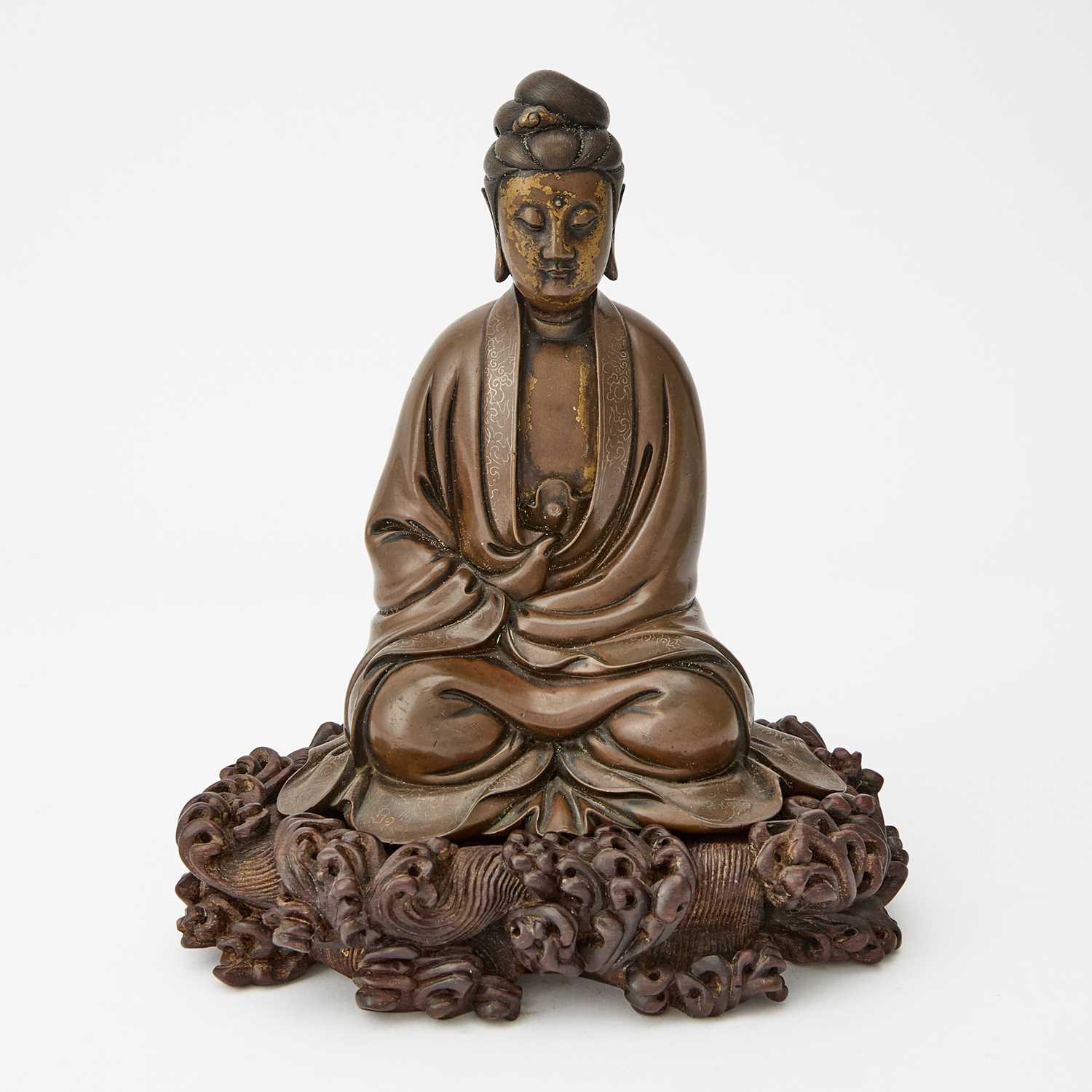 Lot 54 - A Finely-Cast Chinese Wire-Inlaid Bronze Figure of Guanyin