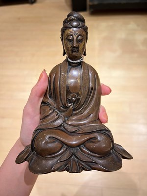 Lot 54 - A Finely-Cast Chinese Wire-Inlaid Bronze Figure of Guanyin