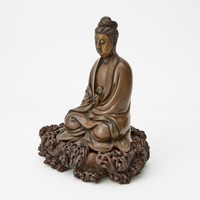 Lot 54 - A Finely-Cast Chinese Wire-Inlaid Bronze Figure of Guanyin