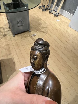 Lot 54 - A Finely-Cast Chinese Wire-Inlaid Bronze Figure of Guanyin