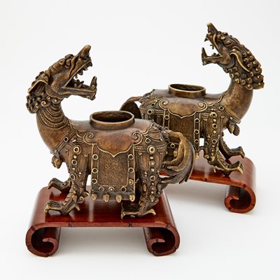 Lot 12 - A Pair of Chinese Bronze Mythical Beast-Form Censers or Waterpots