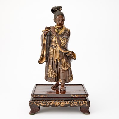 Lot 37 - A Japanese Parcel Gilt Bronze Figural Sculpture of Fujiwara no Yasumasa Playing the Flute
