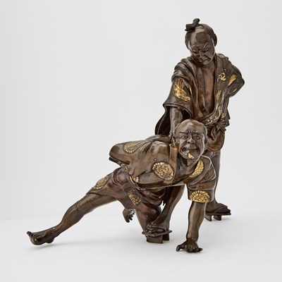 Lot 25 - A Japanese Parcel Gilt Bronze Figural Group