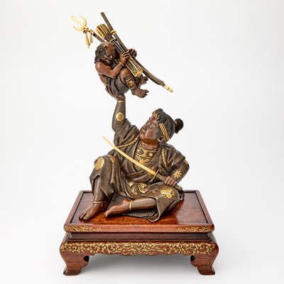 Lot 35 - A Japanese Parcel Gilt Bronze Figural Sculpture of Momotaro Holding Aloft an Oni
