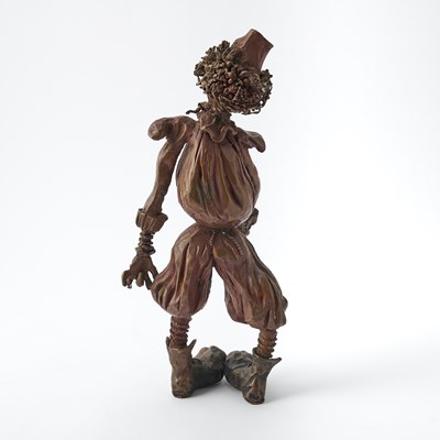 Lot 616 - An original bronze maquette with photos of Michael Jackson's "Scarecrow" Costume in The Wiz