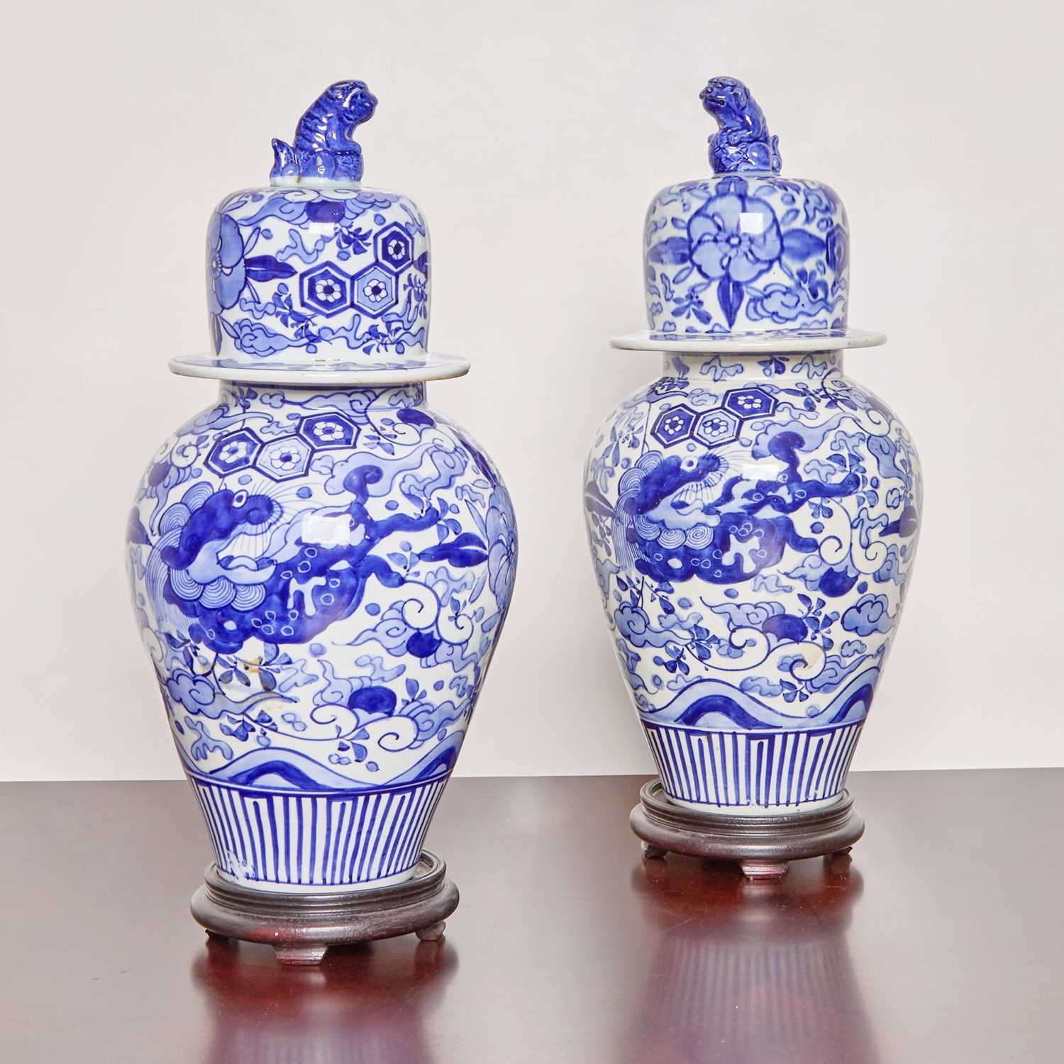 Lot 177 - Pair of Japanese Blue and White Porcelain Baluster Vases and Covers